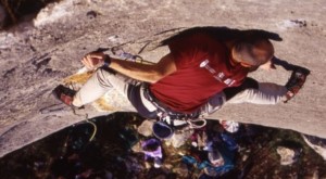 Luca Bridda in arrampicata su Lo Gnomo, falesia di Dvigrad